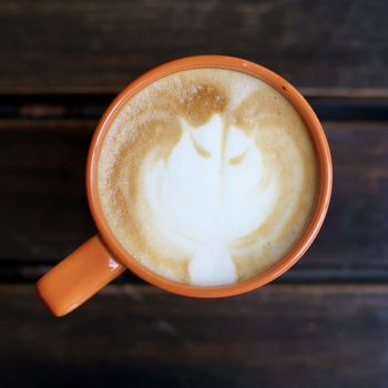coffee cup on wooden background
