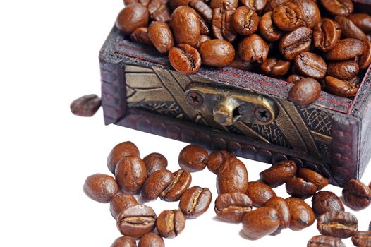 Vintage wooden box with coffee beans close up isolated                               
