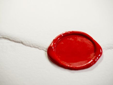 white letter closed by red sealing wax