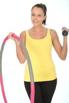Healthy Young Woman Holding a Dumb Bell and Hula Hoop Smiling and Looking Happy