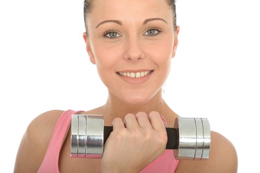 Healthy Happy Young Woman Training With Weights Smiling Looking at the Camera