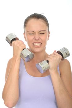 Healthy Young Woman Clenching Her Teeth Training With Weights Looking Strained or Stressed