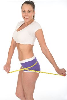 Healthy Fit Young Woman Checking Her Weight Loss With a Tape Measure