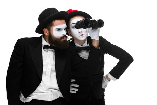 Two memes as business people  looking through binoculars isolated on white background. concept of search and surprise