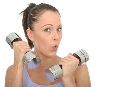 Healthy Young Woman Training With Dumb Bell Weights Looking Shocked or Surprised