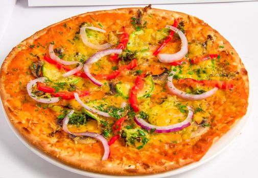 Tasty italian Pizza cooked with zucchini and peppers