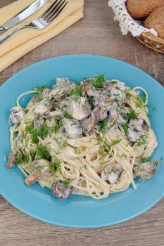 Spaghetti with mushroom cream sauce and dill. Dish for Lent