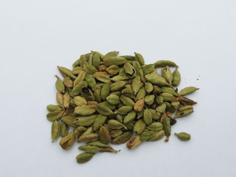 a bunch of green cardamon seeds