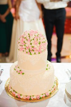 Wedding cake decorated with beautiful flowers