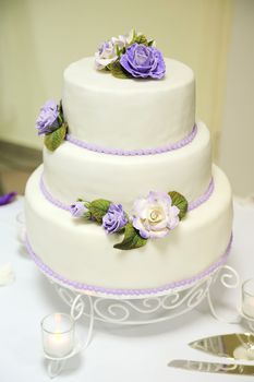 Wedding cake decorated with beautiful flowers