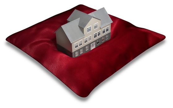 Illustration of a building on top of a red pillow