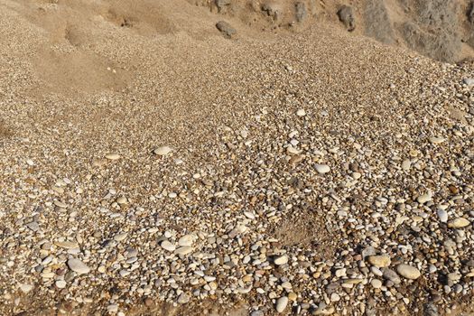 Small gravel stones texture background,sand and shells