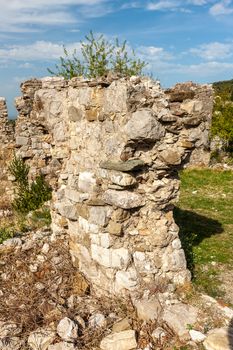 The high fortress walls with the scenic mountains on the background, Stari Bar, Montenegro.