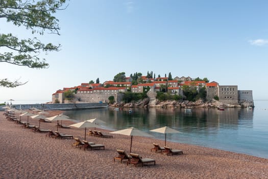 St. Stephan island in Adriatic Sea in Montenegro. view from the empty beach in the early morning