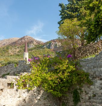 The high fortress walls with the scenic mountains on the background, Stari Bar, Montenegro.