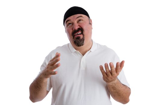 Man offering up a so-so prayer in an undecided frame of mind pulling a comical face as he looks to Heaven, isolated on white
