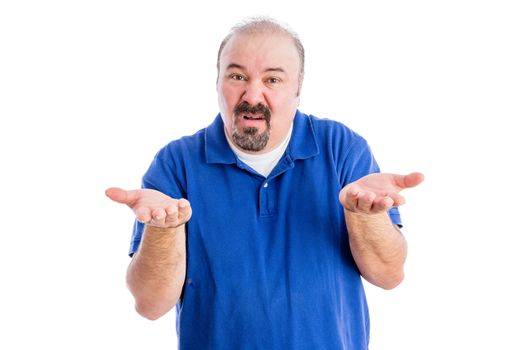 Middle-aged derisive man shrugging his shoulders and gesticulating as he shows his ignorance and disdain, isolated on white