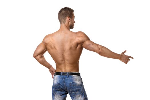 Back of a young man with well trained body, triceps, lats and rhomboid muscle and wearing a denim trousers