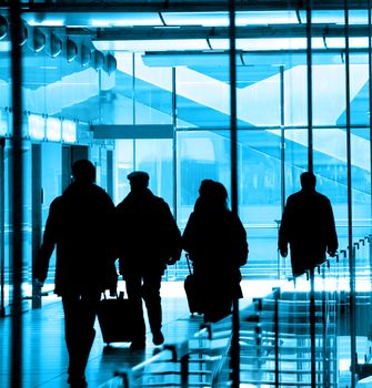 Passengers at the airport rushing to their flights