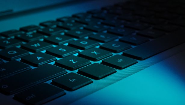 Closeup view of computer (notebook) keyboard, colorized