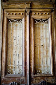 An image of a pair of large rustic doors