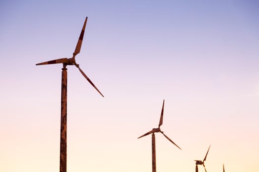 Wind turbines. Electricity with wind power. The sky was almost dark in the evenings.