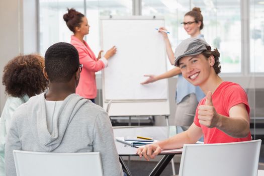 Fashion student giving a presentation at the college