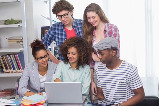 Fashion students working as a team at the college