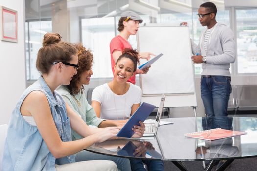 Fashion students working as a team at the college