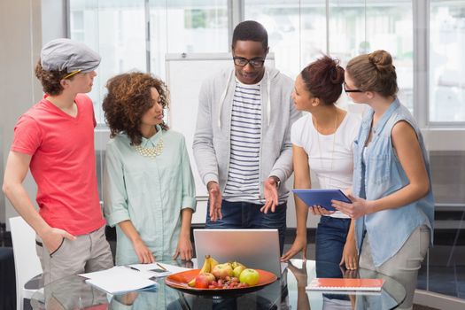 Fashion students working as a team  at the college