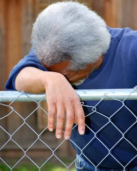 African american male expressions outside alone.