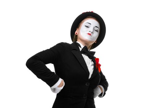 Portrait of the proud and arrogant woman as mime in a proud pose. isolated on white background. The concept of excellence