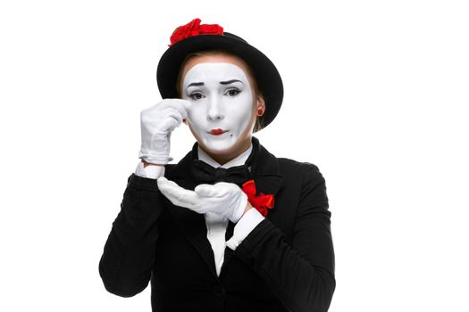 Portrait of the sad and crying woman as mime isolated on white background. Concept of resentment and bitterness