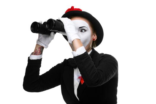 Portrait of the searching woman as mime with binoculars isolated on white background. Concept intense search