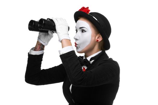 Portrait of the searching woman as mime with binoculars isolated on white background. Concept intense search