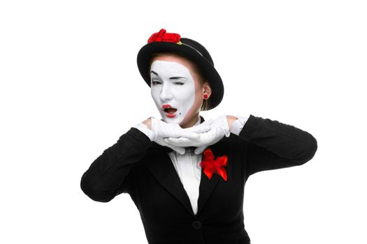 Portrait of the surprised woman as mime with a grimace on her face isolated on white background. 