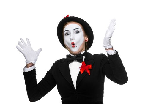 Portrait of the surprised and joyful woman as mime with open mouth isolated on white background. Concept greetings and happiness