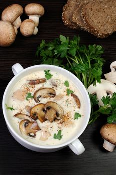 creamy soup pureed mushrooms and slices of chicken