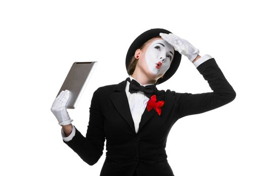 tired from work business woman in the image mime holding tablet PC isolated on white background