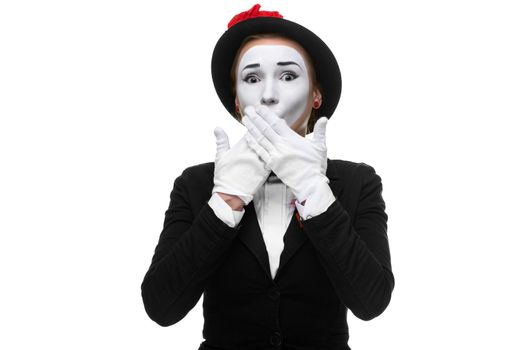 Portrait of the frightened woman as mime isolated on white background. Concept of approval and recommendations