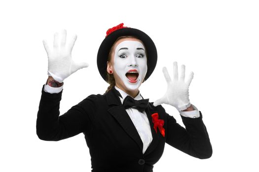 Portrait of the surprised and joyful woman as mime with open mouth isolated on white background. Concept  of wonder and joy