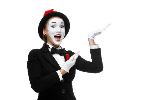 Portrait of the surprised and joyful woman as mime isolated on white background. Concept of approval and recommendations