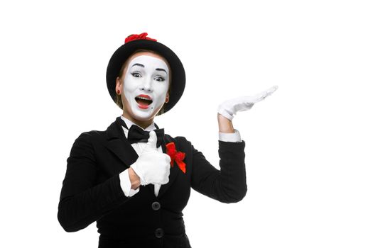 Portrait of the surprised and joyful woman as mime isolated on white background. Concept of approval and recommendations