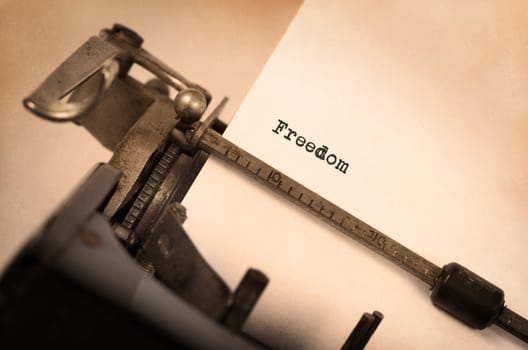 Vintage inscription made by old typewriter, Freedom