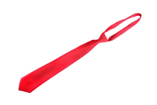 A red tie with diagonal stripes design, isolated on white background.
