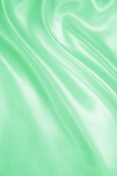 Smooth elegant green silk or satin can use as background 