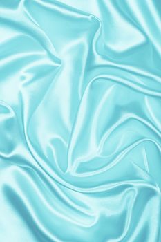 Smooth elegant blue silk or satin can use as background