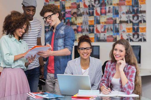 Fashion students working as a team  at the college