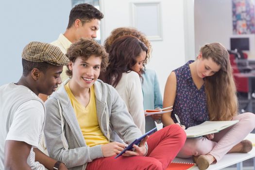 Fashion students reading their notes at the college