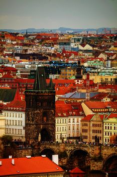 Overview of old Prague with Charles bridge before sunset